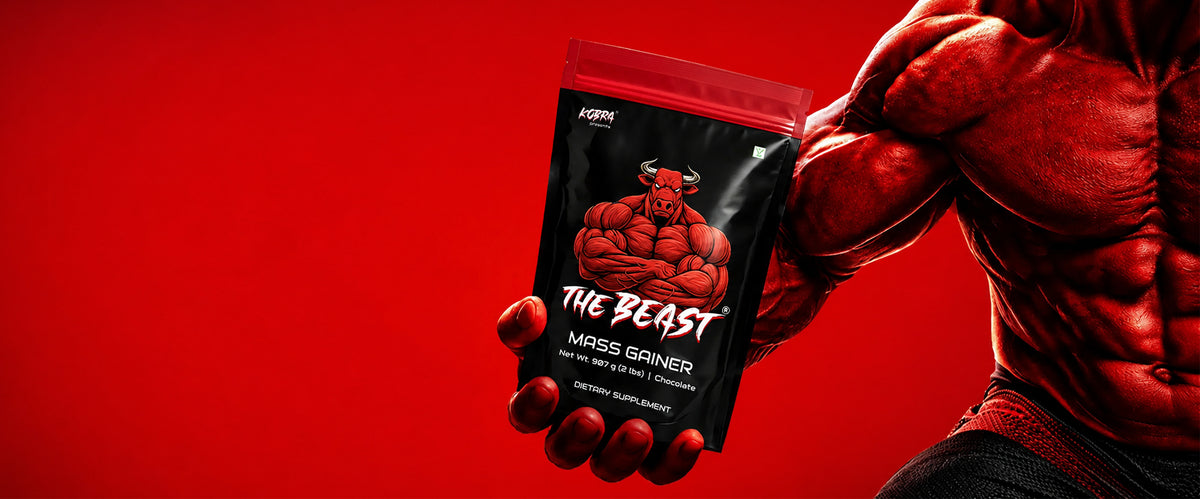 A muscular red creature holding a black pouch of Kabi The Beast Mass Gainer against a solid red background.